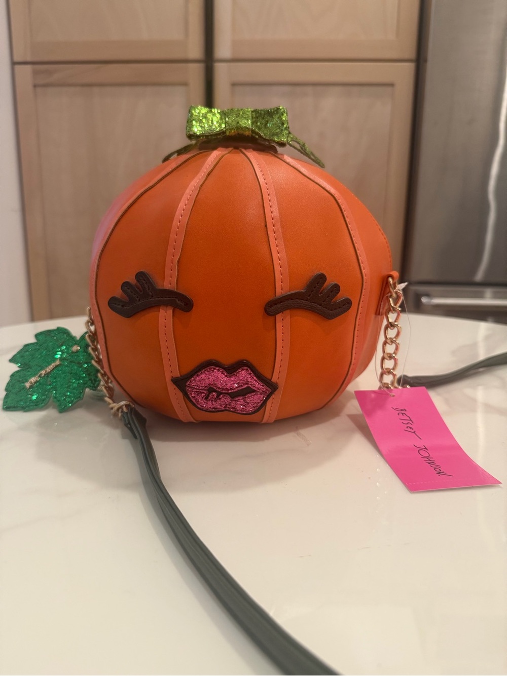 Betsy Johnson Pumpkin Crossbody Bag with Pink Lip Accent